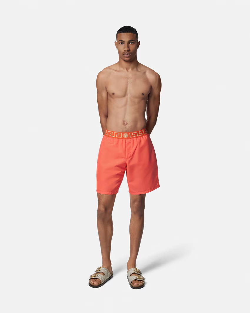 Greca Border Boardshorts – the swimwear style falls above the knee in a straight, tapered fit – LUX VERSE Luxury Designer Fashion Outlet