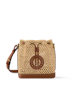 Noé BB Natural leather – this Noé BB bucket bag seamlessly merges two distinct crafts: natural raffia, – LUX VERSE Luxury Designer Fashion Outlet