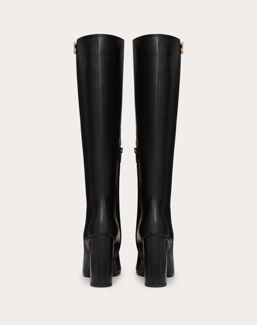 Vlogo the Bold Edition Boot in Calfskin 100mm – signature in gold tone finish- Leather-covered block heel- Heel height – LUX VERSE Luxury Designer Fashion Outlet