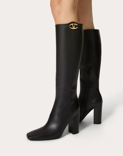 Vlogo the Bold Edition Boot in Calfskin 100mm – signature in gold tone finish- Leather-covered block heel- Heel height – LUX VERSE Luxury Designer Fashion Outlet
