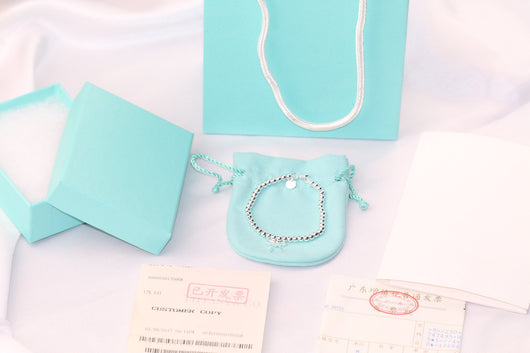 STERLING SILVER BOW BEAD BRACELET - LUX VERSE - Luxury designer fashion outlet
