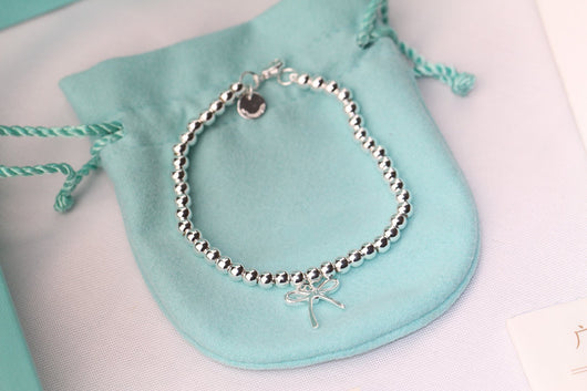 STERLING SILVER BOW BEAD BRACELET - LUX VERSE - Luxury designer fashion outlet