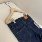 Blauer Denim mit Monogramm am Saum, gerade geschnitten – Damen