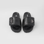 Soft padded nappa leather slides – these padded nappa leather slides with a nineties feel have a minimalist, – LUX VERSE Luxury Designer Fashion Outlet