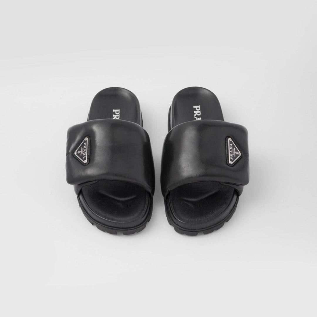 Soft padded nappa leather slides – these padded nappa leather slides with a nineties feel have a minimalist, – LUX VERSE Luxury Designer Fashion Outlet