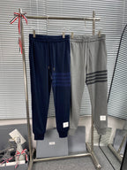 Marineblaue Baumwoll-Jogginghose mit vier Streifen – Herren