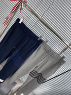 Marineblaue Baumwoll-Jogginghose mit vier Streifen – Herren