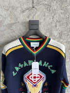 Navy Wollpullover mit Rundhalsausschnitt und Wappen-Intarsie – Herren