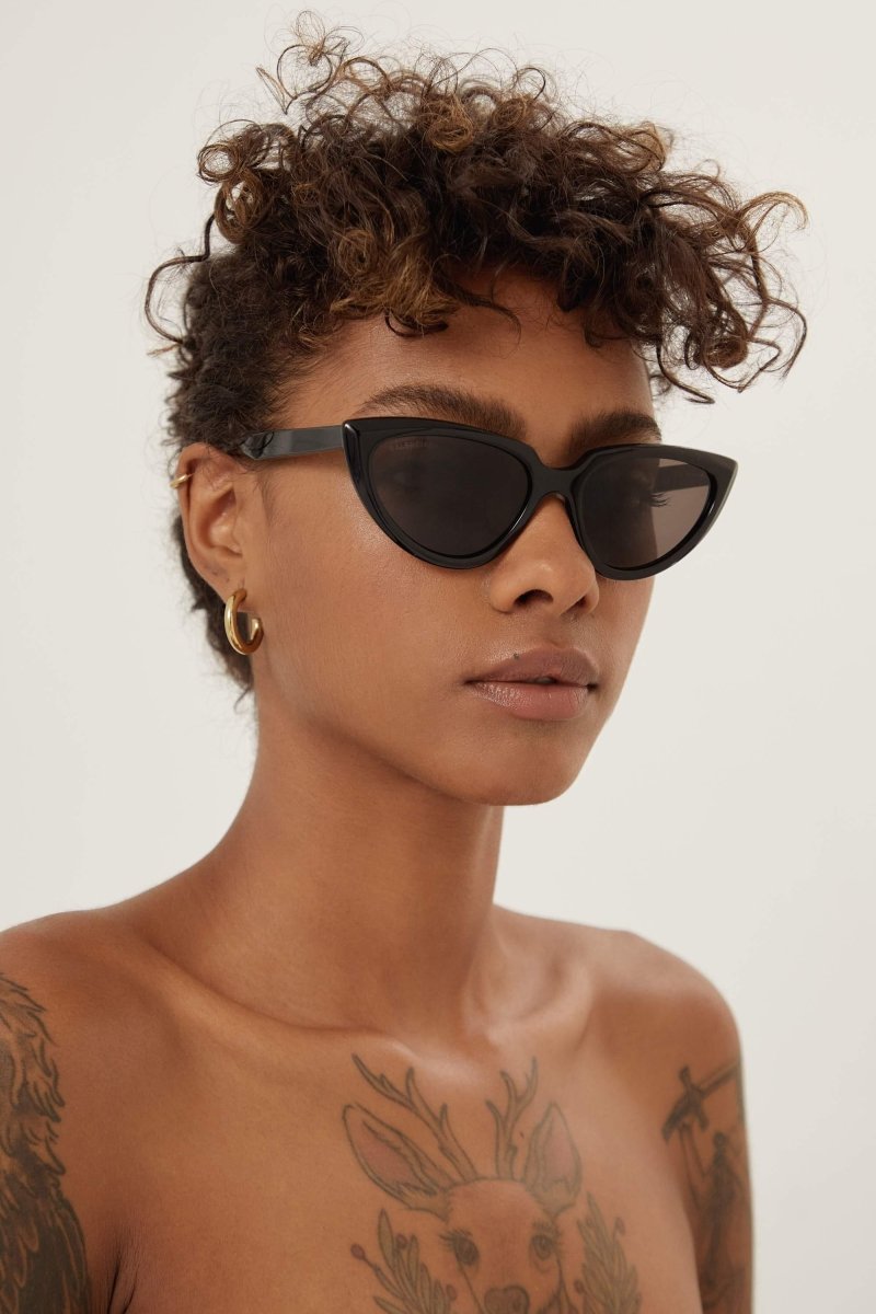 Angular black cat-eye sunglasses – acetate style with distinctive three-dimensional twist on front pieces – LUX VERSE Luxury Designer Fashion Outlet