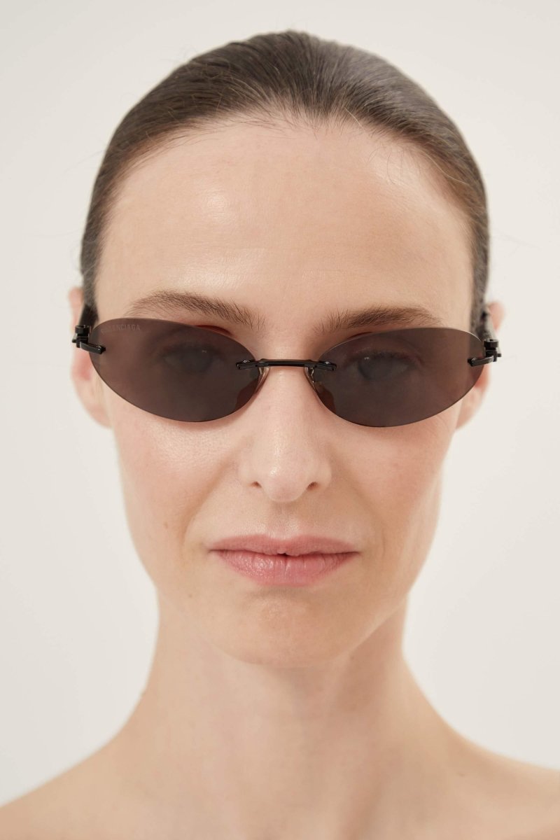 BB0179S oval metal black sunglasses – full lettering logo on the top of the temple in high-relief looking up, – LUX VERSE Luxury Designer Fashion Outlet
