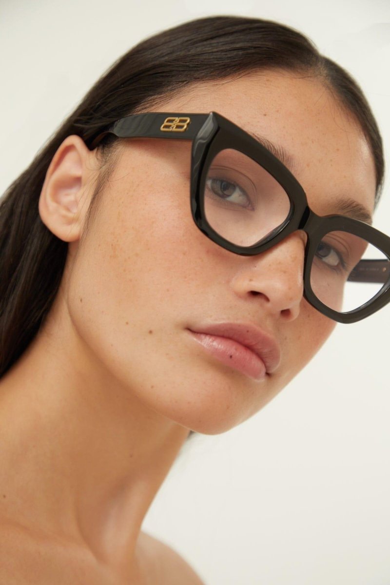 Bold black frames – the red sku features a unique carbon fiber effect – LUX VERSE Luxury Designer Fashion Outlet