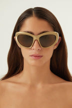 Bold wrap around gold sunglasses – oval shape with wrap-around profiles in BIO Injection, sleek and ergonomic design – LUX VERSE Luxury Designer Fashion Outlet