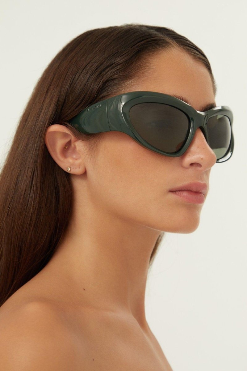 Bold wrap around green sunglasses – a brand statement in terms of silhouette and fashion realism, these products will be – LUX VERSE Luxury Designer Fashion Outlet