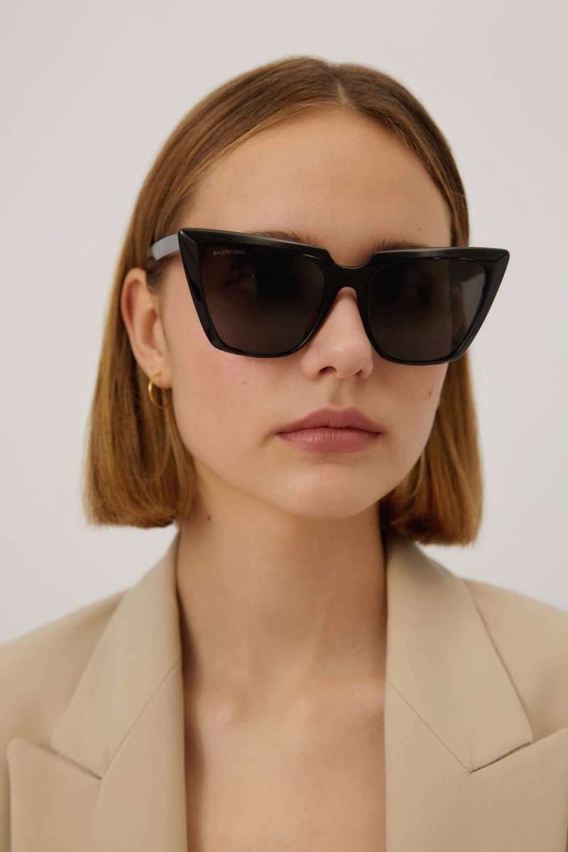 Cat-eye femenine black sunglasses – twist on easy-to-wear acetate frame: pointed edges exaggerated through – LUX VERSE Luxury Designer Fashion Outlet