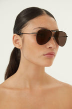 Metal pilot sunglasses with logo – full lettering logo on the front of the sunglasses in black – LUX VERSE Luxury Designer Fashion Outlet