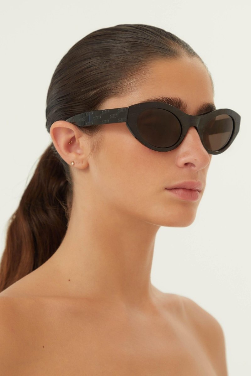 Oval femenine black sunglasses – unique 80’s opulent aesthetics – LUX VERSE Luxury Designer Fashion Outlet