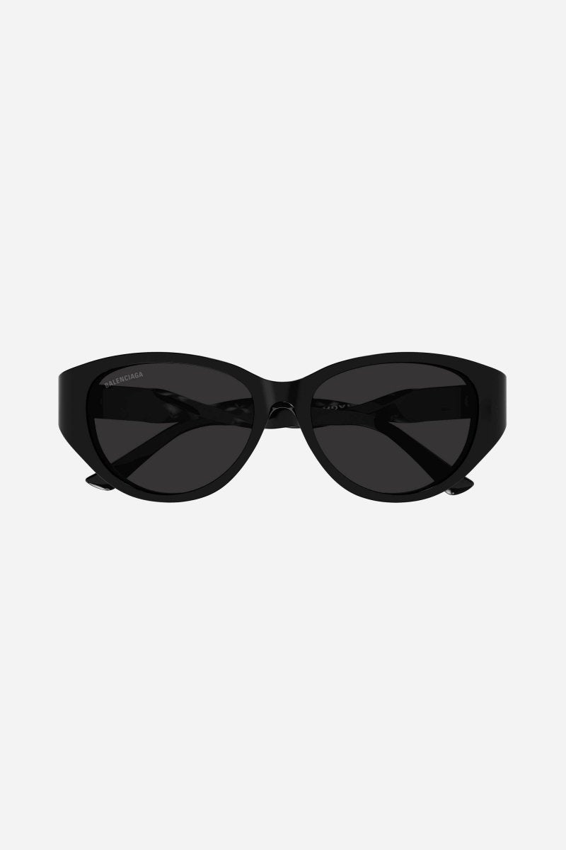 Oval twisted black sunglasses – each temple pivoted until it appears truly twisted – LUX VERSE Luxury Designer Fashion Outlet
