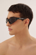 Xpander BB0202s-001 wrap around black sunglasses – lenses are set atop curved, bio injected frames, as opposed to inside or behind them – LUX VERSE Luxury Designer Fashion Outlet