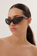 Xpander BB0202s-001 wrap around black sunglasses – high relief metallic logo is prominently stamped on the middle of – LUX VERSE Luxury Designer Fashion Outlet