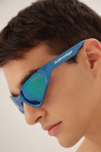 Xpander blue BB0202s-003 wrap around sunglasses – lenses are set atop curved, bio injected frames, as opposed to inside or behind them – LUX VERSE Luxury Designer Fashion Outlet