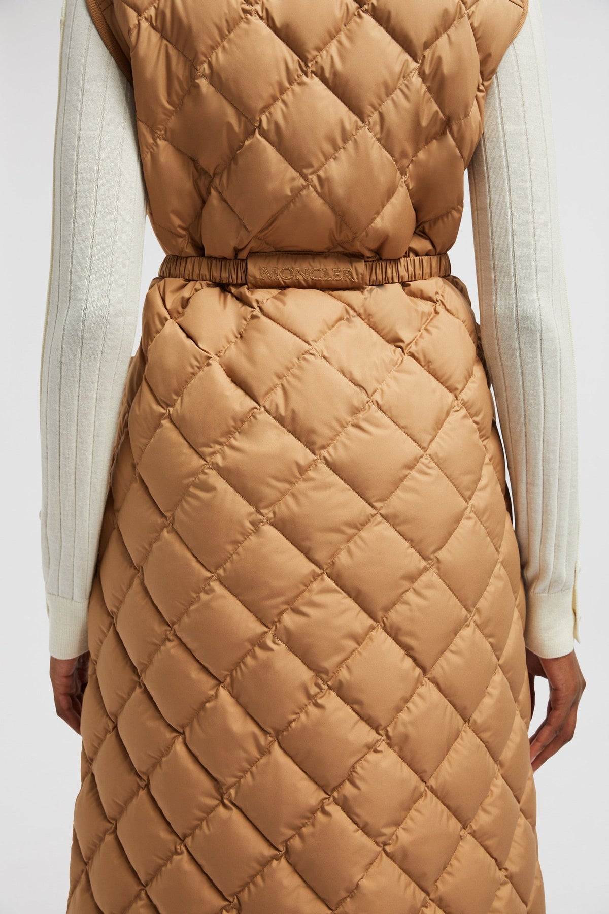 Butor Long Down Vest – a lightweight style, the puffer comes with snap button closure – LUX VERSE Luxury Designer Fashion Outlet