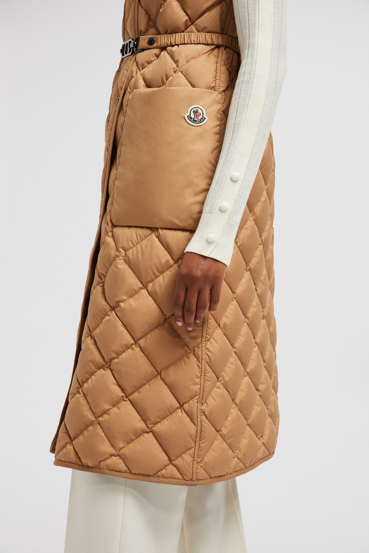 Butor Long Down Vest – a lightweight style, the puffer comes with snap button closure – LUX VERSE Luxury Designer Fashion Outlet
