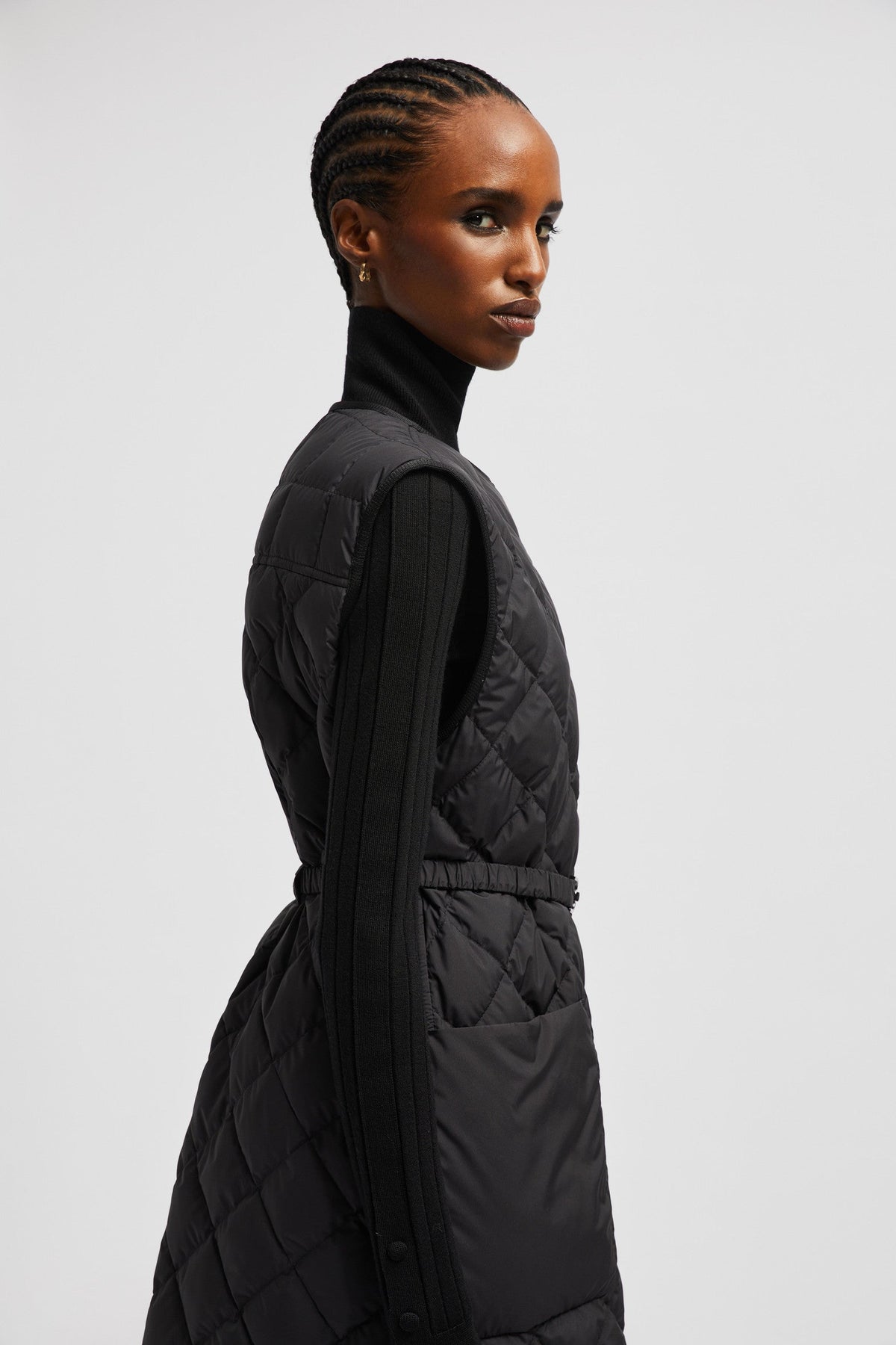 Butor Long Down Vest – a lightweight style, the puffer comes with snap button closure – LUX VERSE Luxury Designer Fashion Outlet