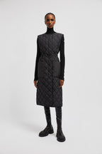 Butor Long Down Vest – crafted from recycled polyester, the long vest boasts geometric quilting – LUX VERSE Luxury Designer Fashion Outlet