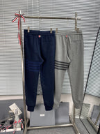 Marineblaue Baumwoll-Jogginghose mit vier Streifen – Herren