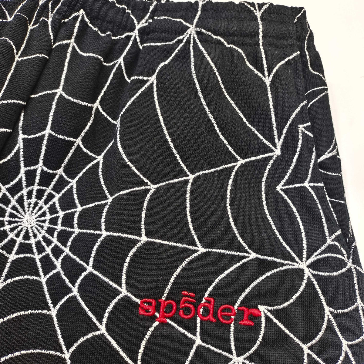Black Cotton Web Print Joggers - Men's