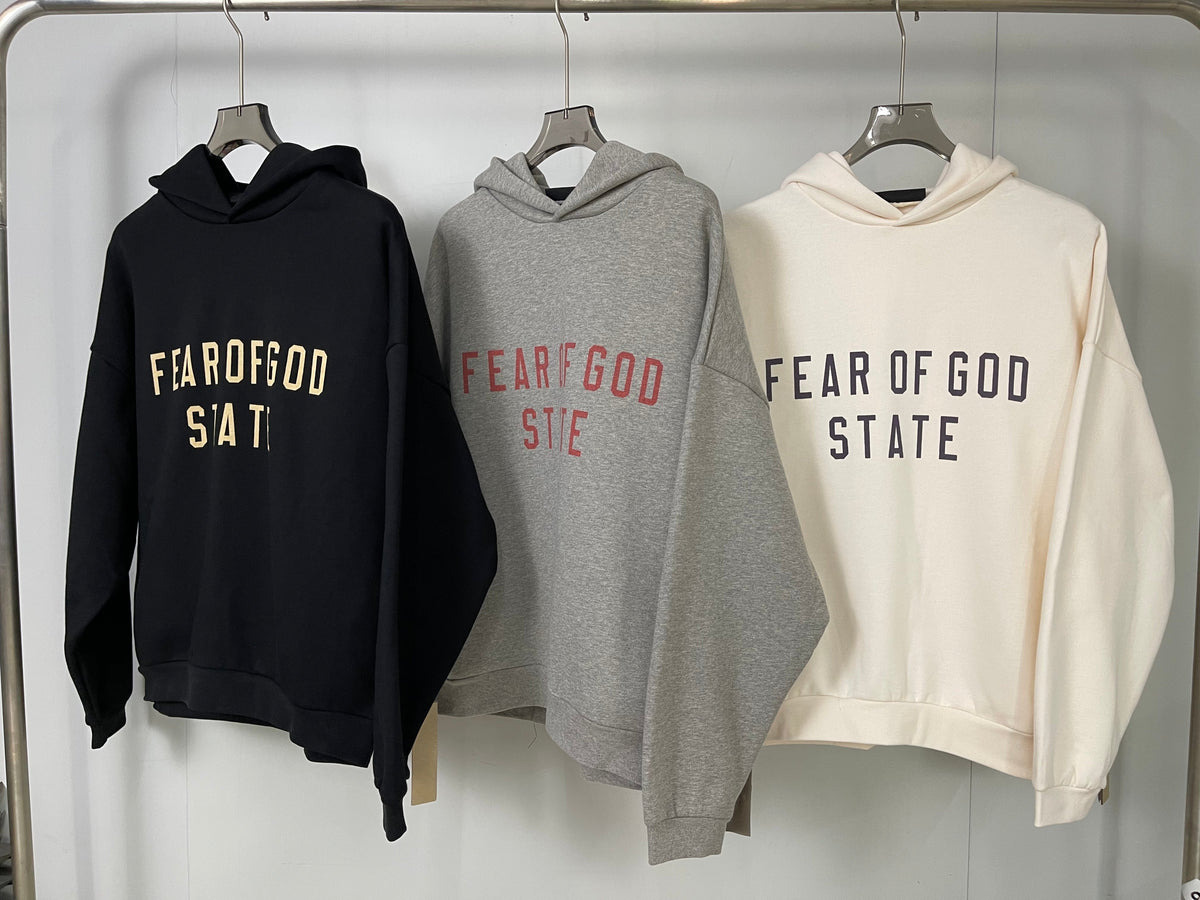 Schwarzer Pullover aus Baumwolle mit goldenem Text – Herren