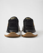 Leather silhouette sneakers – the shoe decorated with different interpretations of the logo is completed by – LUX VERSE Luxury Designer Fashion Outlet