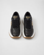 Leather silhouette sneakers – leather lining Enameled metal triangle logo Closure with polyester laces Rubber – LUX VERSE Luxury Designer Fashion Outlet