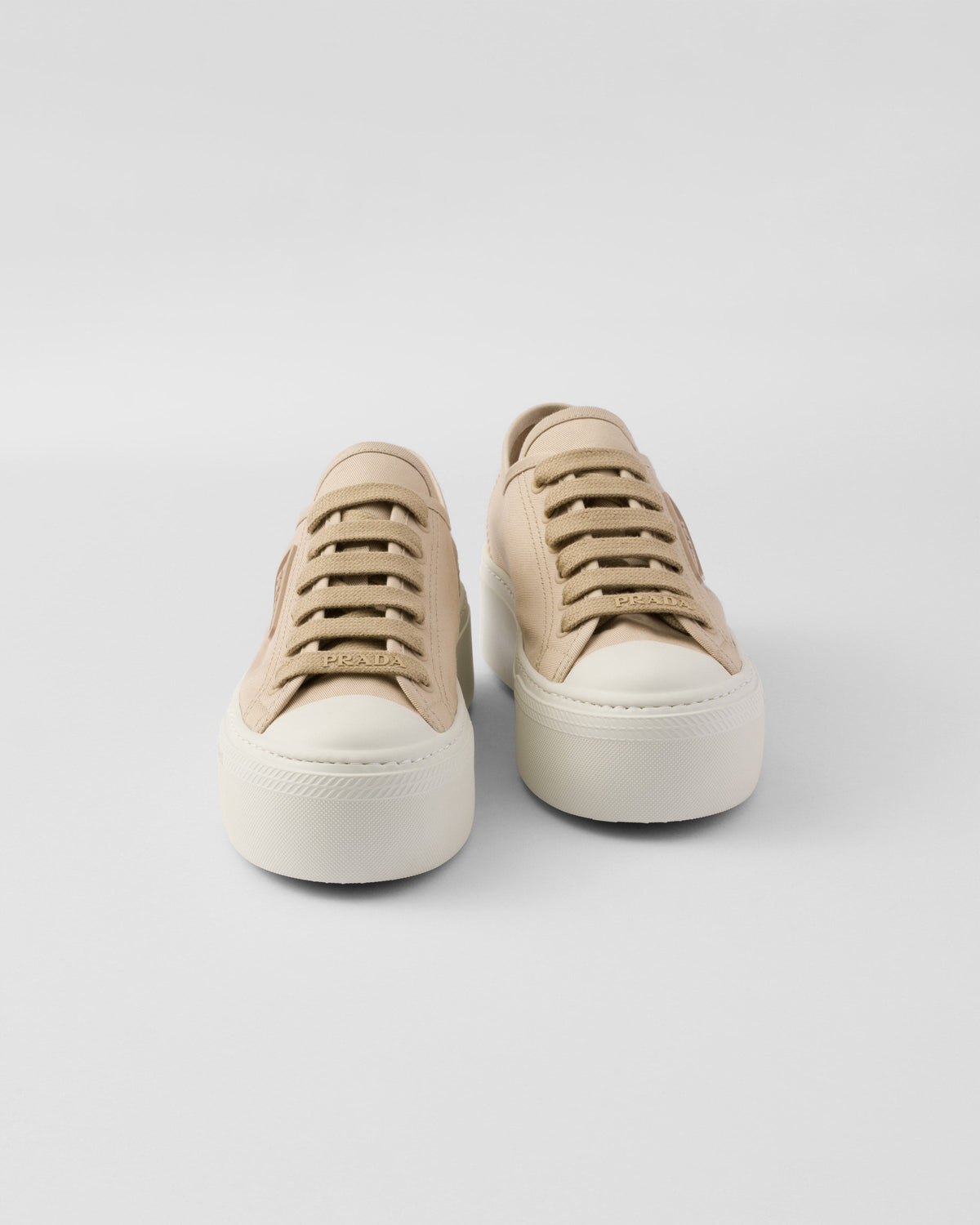 Laced sneakers – upper with rubber toe cap Leather lining--Embossed rubber triangle logo Logo-print – LUX VERSE Luxury Designer Fashion Outlet