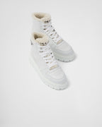 Leather and shearling high-top sneakers – upper with enameled eyelets Shearling lining Enameled metal triangle logo Closure – LUX VERSE Luxury Designer Fashion Outlet