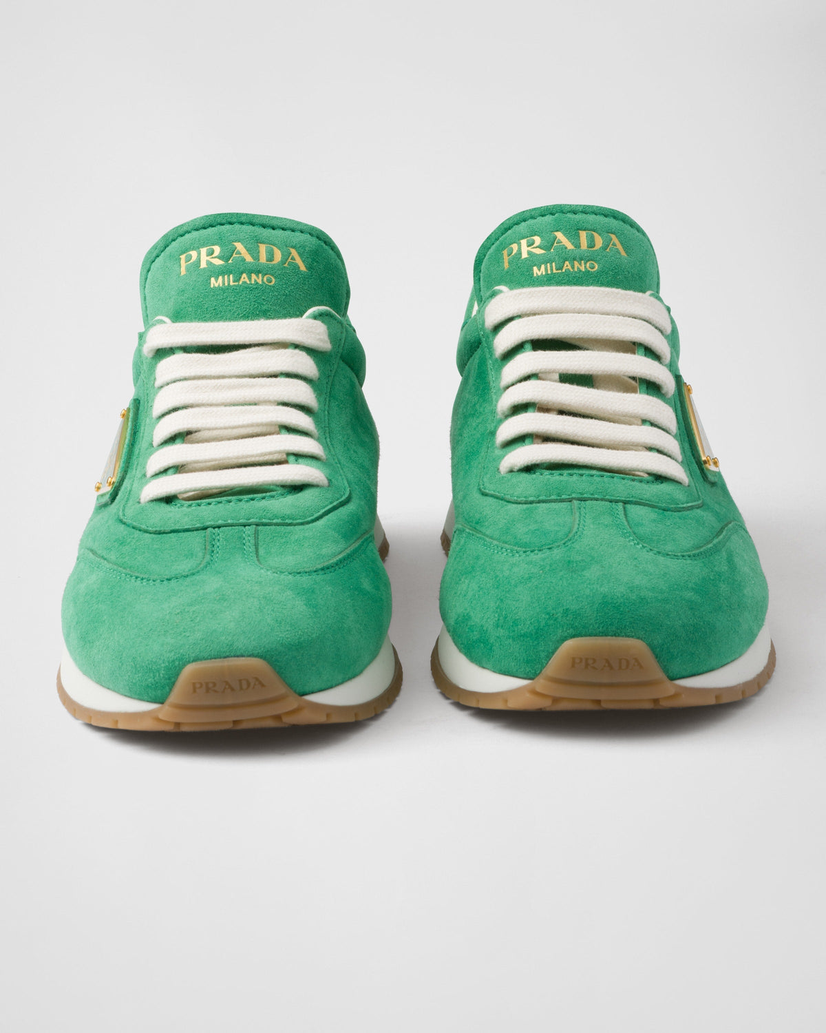 Suede rubber sneakers – the versatile style is completed by the enameled metal triangle logo that – LUX VERSE Luxury Designer Fashion Outlet