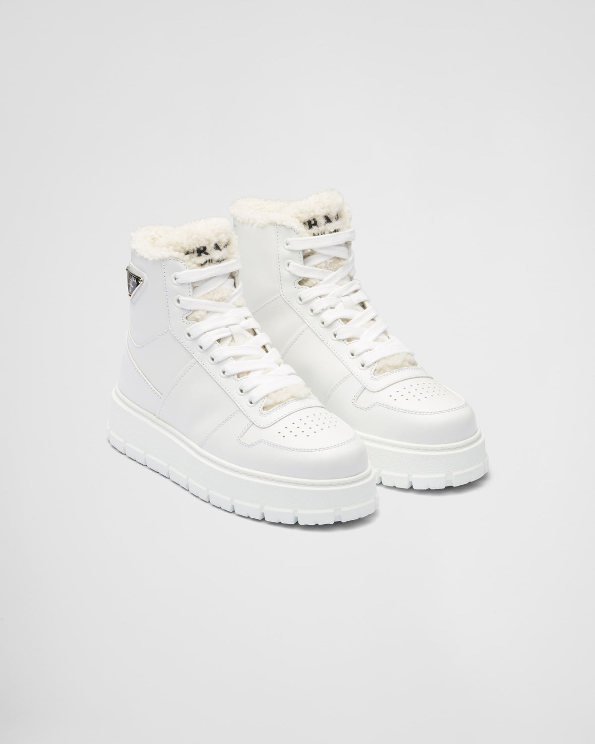 Leather and shearling high-top sneakers – an unexpected detail, a tongue in soft shearling decorated with the embroidered – LUX VERSE Luxury Designer Fashion Outlet