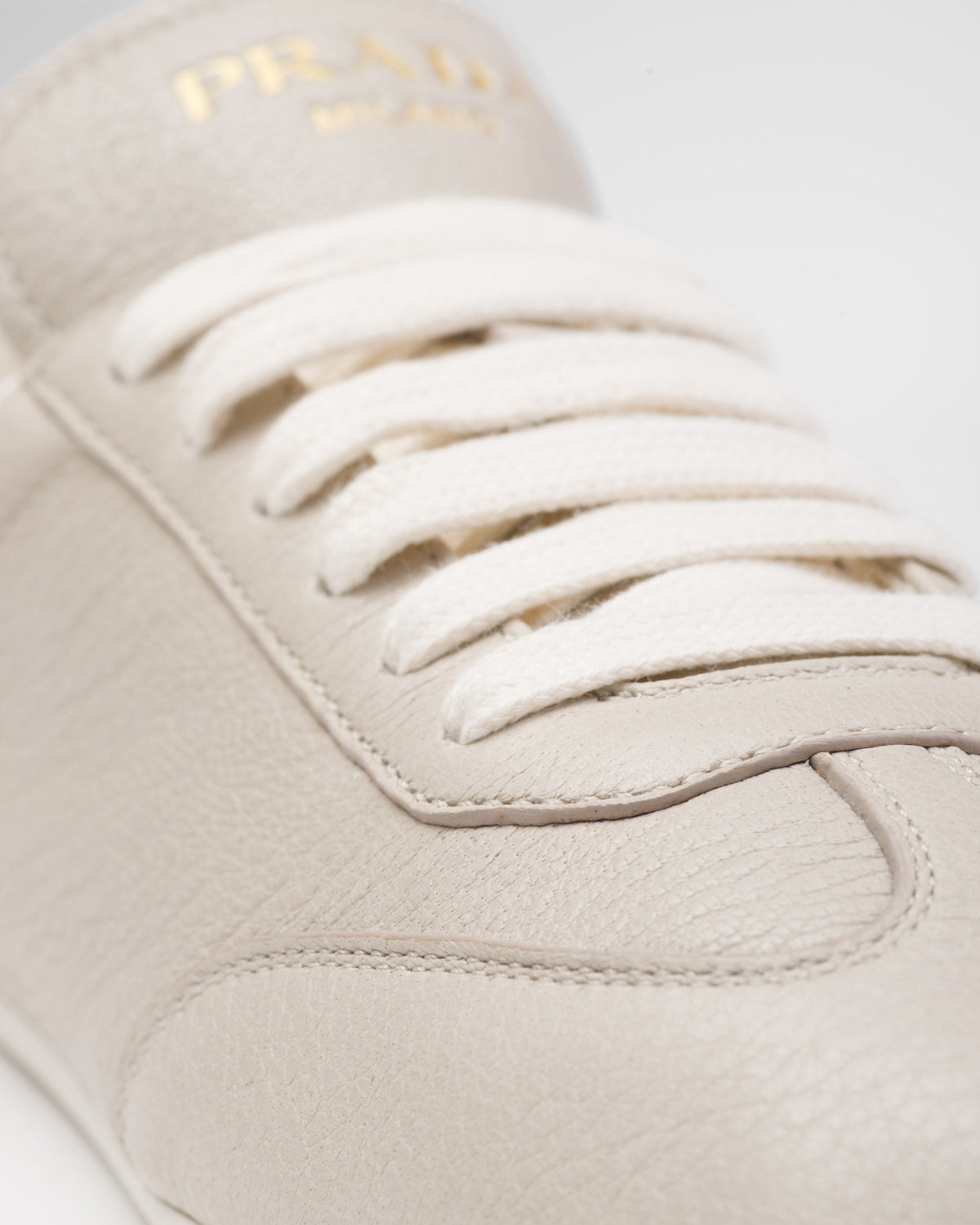 Leather classic sneakers – upper with rubber toe cap Leather lining--Embossed rubber triangle logo Logo-print – LUX VERSE Luxury Designer Fashion Outlet