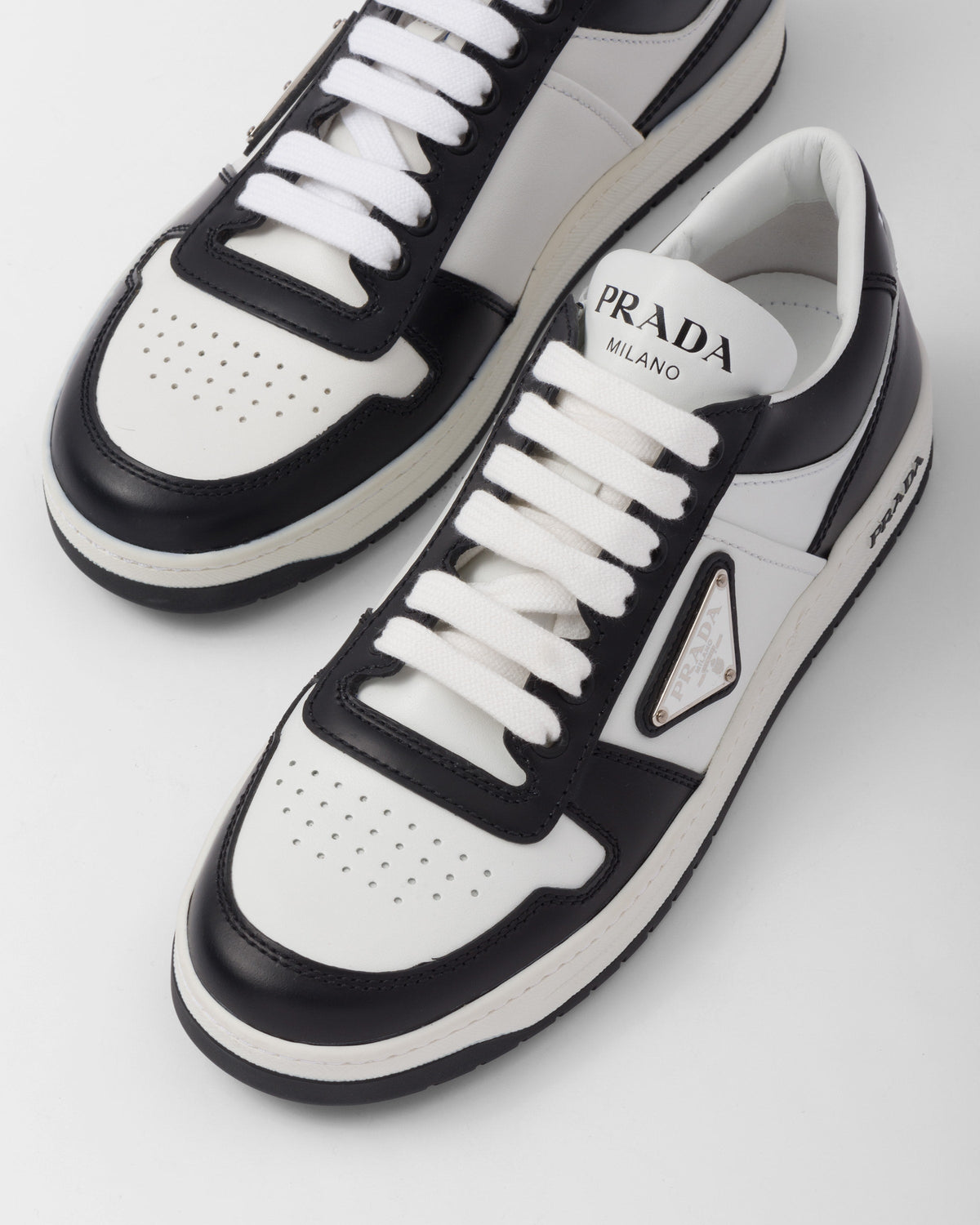 Downtown perforated leather sneakers – perforated motif on the upper Leather lining Enameled metal triangle logo Cotton – LUX VERSE Luxury Designer Fashion Outlet