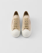 Laced sneakers – the casual and versatile style is embellished with the embossed rubber triangle logo – LUX VERSE Luxury Designer Fashion Outlet