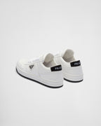 Downtown leather motif sneakers – perforated motif on the upper Leather lining Enameled metal triangle logo Lace-ups – LUX VERSE Luxury Designer Fashion Outlet