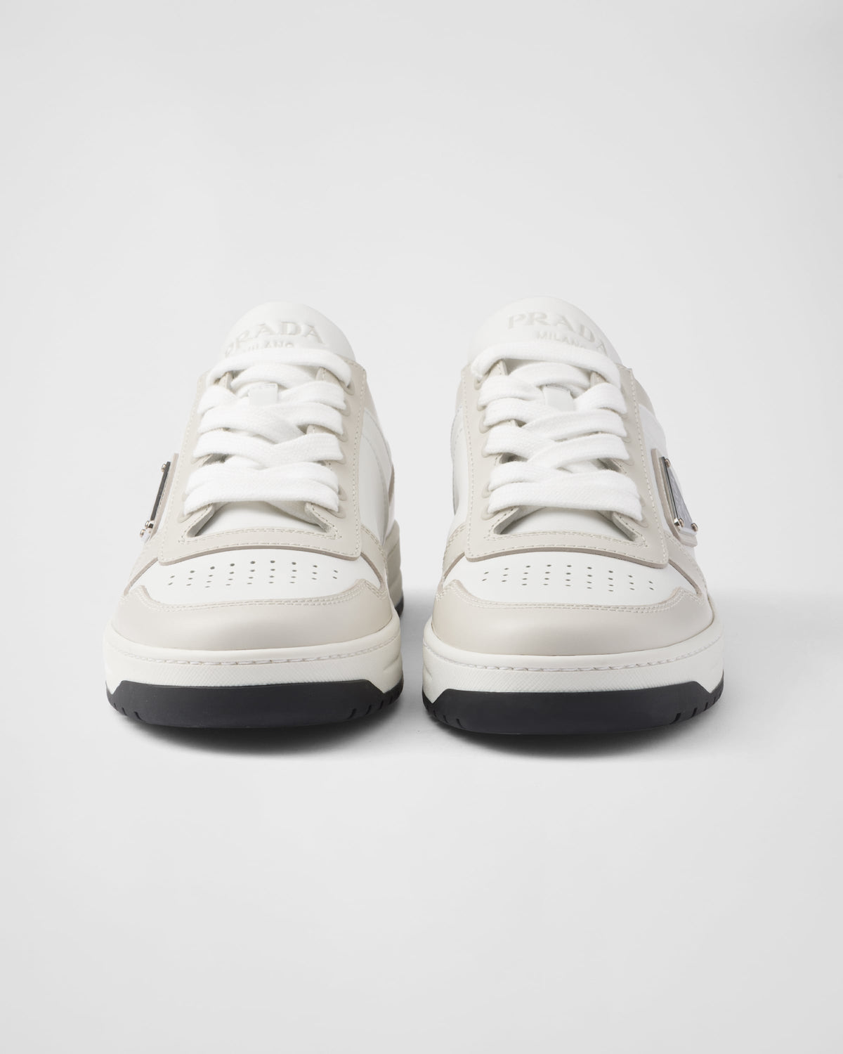 Downtown sporty sneakers – perforated motif on the upper Leather lining Enameled metal triangle logo Lace-ups – LUX VERSE Luxury Designer Fashion Outlet