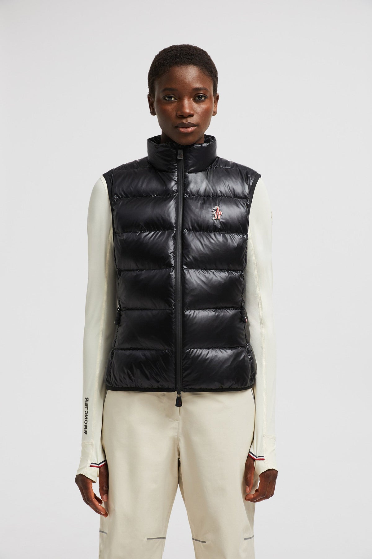 Down Vest – multi-functional: the practical puffer boasts pull-out gloves and is packable- – LUX VERSE Luxury Designer Fashion Outlet