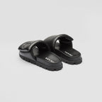 Soft padded nappa leather slides – the triangle logo stands out on the accessory – LUX VERSE Luxury Designer Fashion Outlet