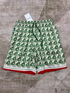 Grüne Seidenshorts mit Monogramm – Herren