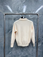 Cremefarbener Langarmstrickpullover mit Herz-Logo – Herren