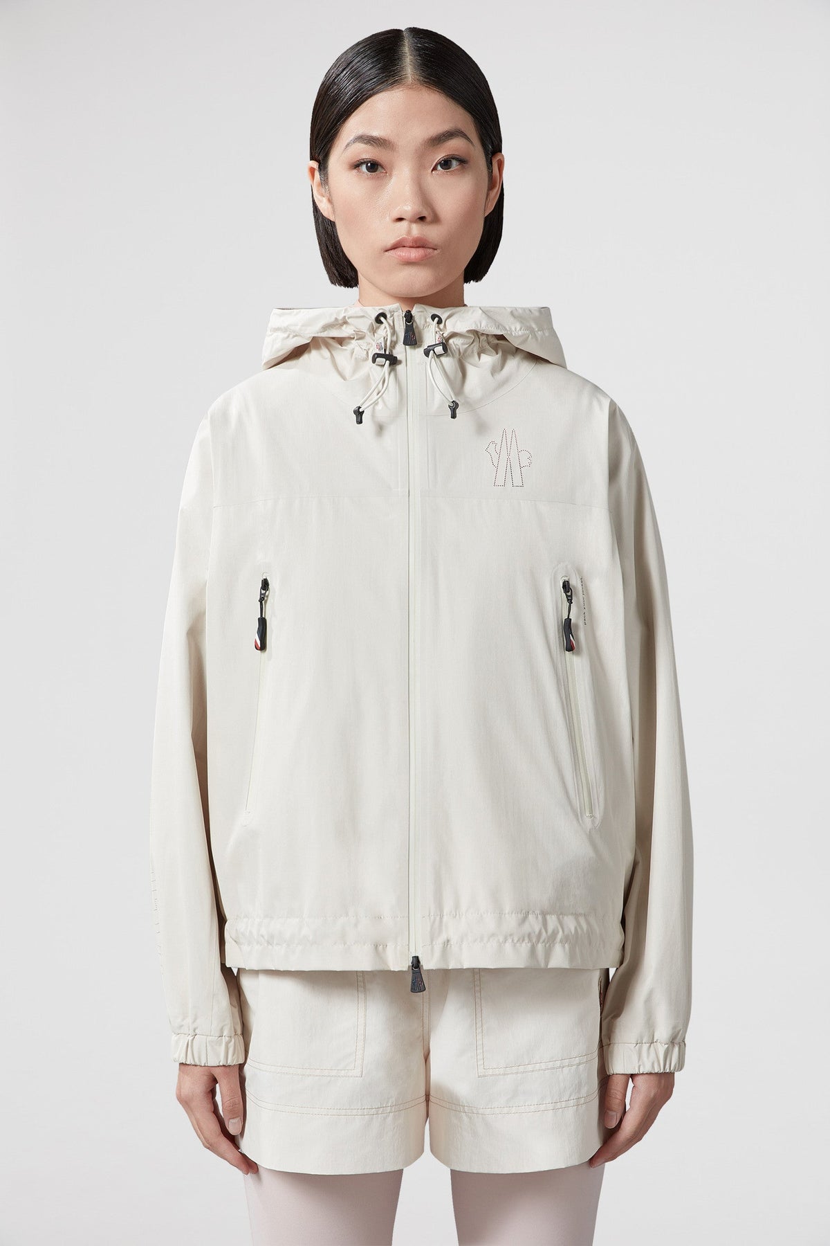 Fanes Hooded Shell Jacket – born out of a deep research of lightweight materials and innovative constructions, – LUX VERSE Luxury Designer Fashion Outlet