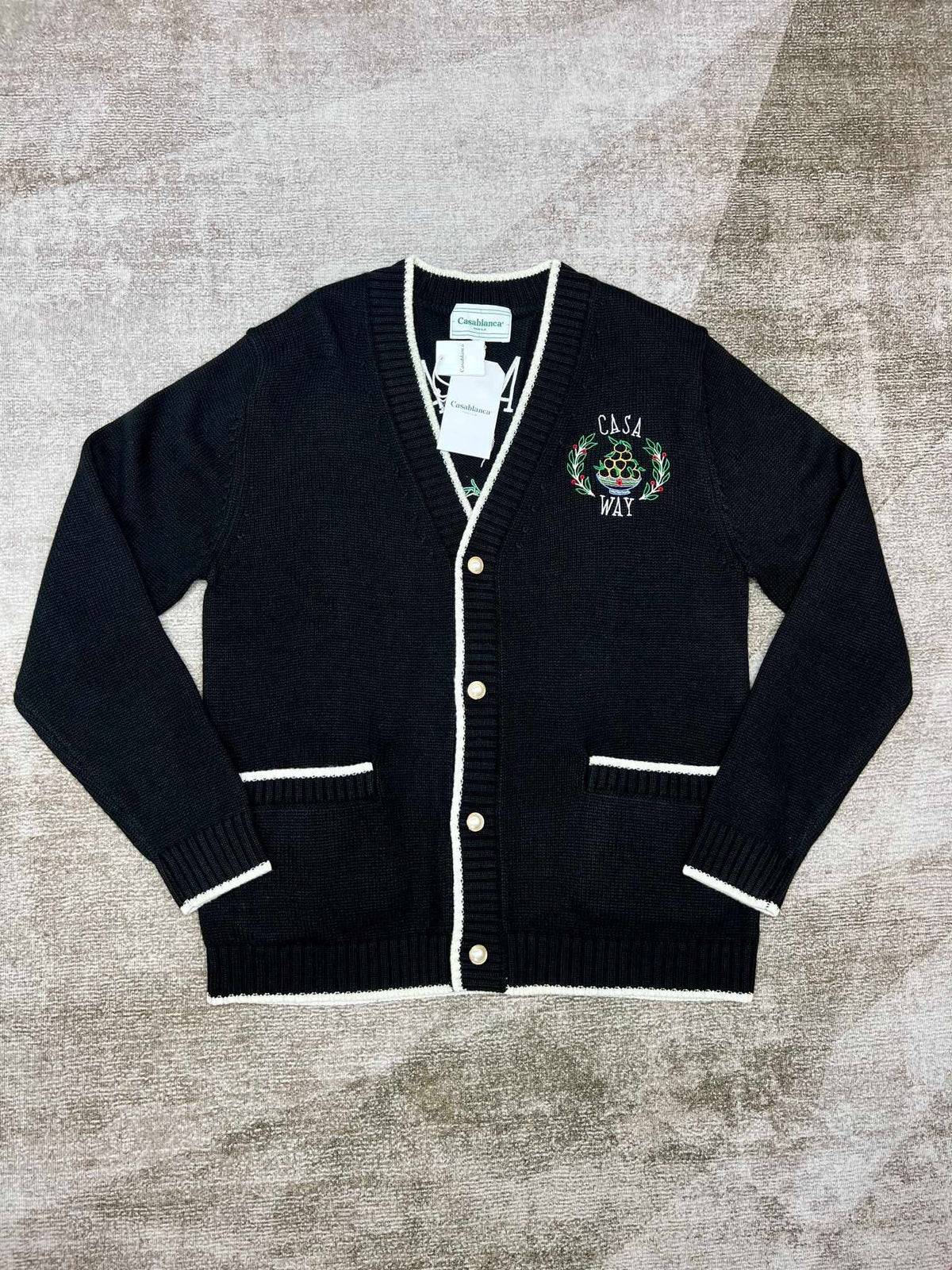 Marineblaue Wollstrickjacke mit gesticktem Wappen – Herren