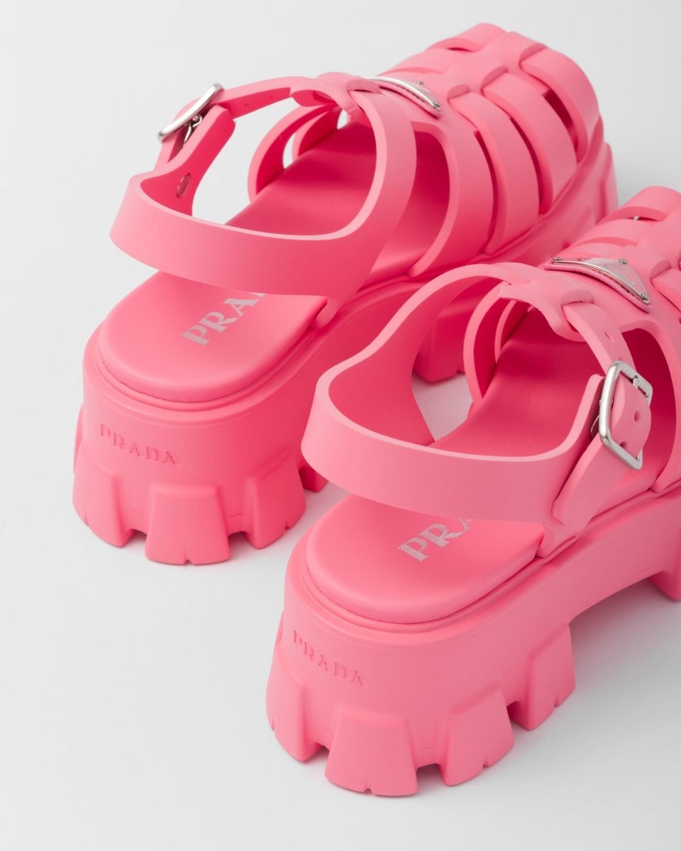 Foam rubber sandals – upper with metal buckle Enameled metal triangle logo Rubber sole: 55 mm Fabric pouch – LUX VERSE Luxury Designer Fashion Outlet