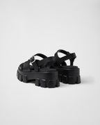 Monolith Rubber Sandals – upper with metal buckle Enameled metal triangle logo Rubber sole: 55 mm Lug sole – LUX VERSE Luxury Designer Fashion Outlet
